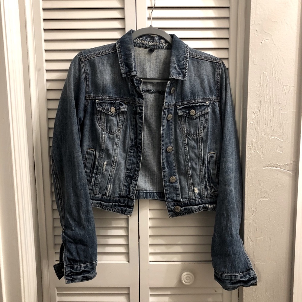 Distressed denim jacket